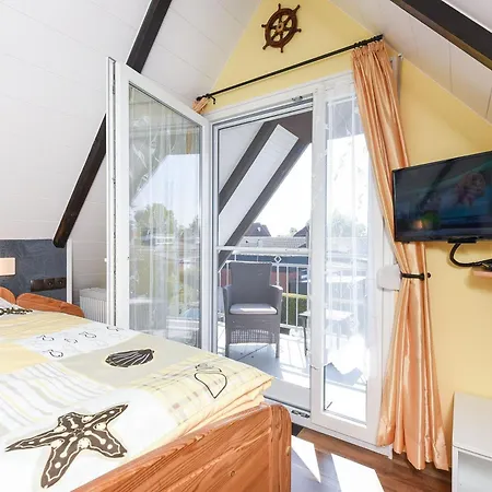 Ferienhaus Kleine Moewe 別荘 ベンサージール